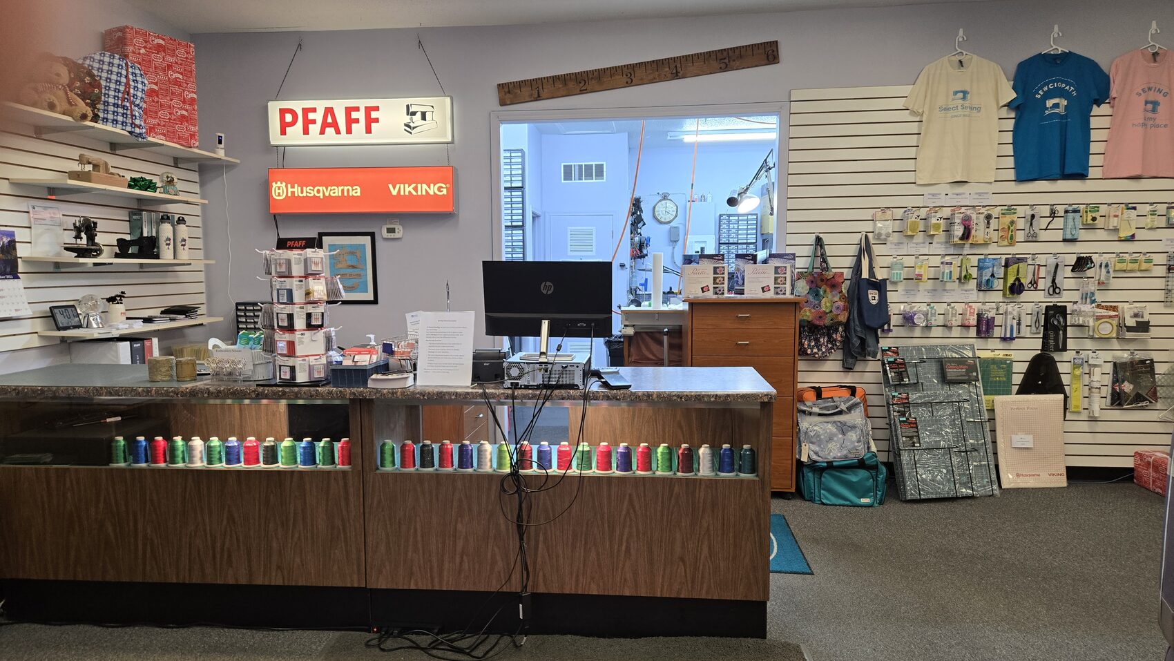 The Select Sewing front counter, an authorized PFAFF and Husqvarna VIKING dealer